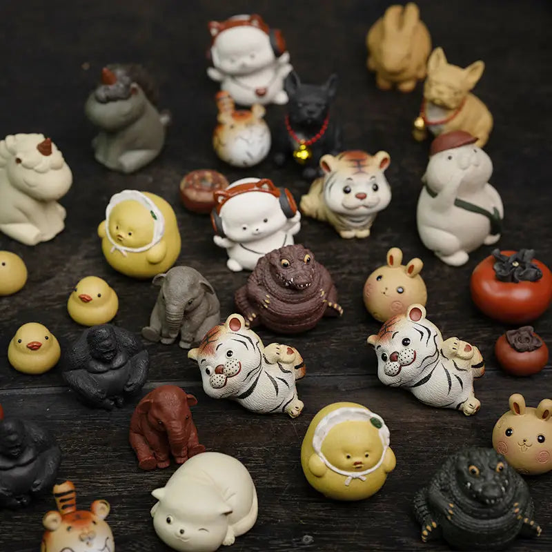 Collection of animal tea pet figurines enhancing feng shui power for tea ceremonies