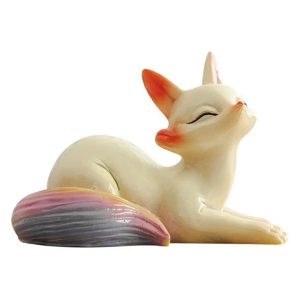 Ceramic fox tea pet figurine with closed eyes, perfect for feng shui and fox tea decor