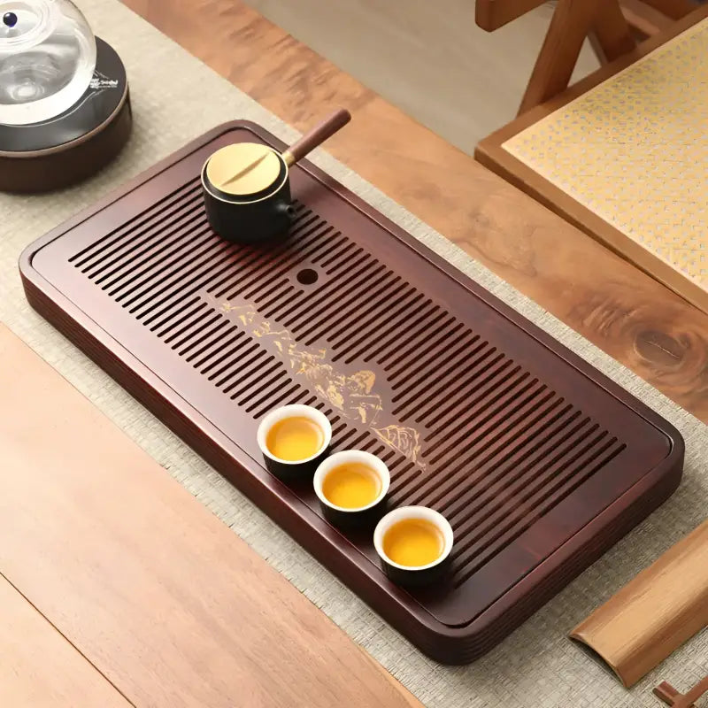 Wooden tea tray with cups and teapot showcasing Still Waters Bamboo Tea Tray for tea lovers