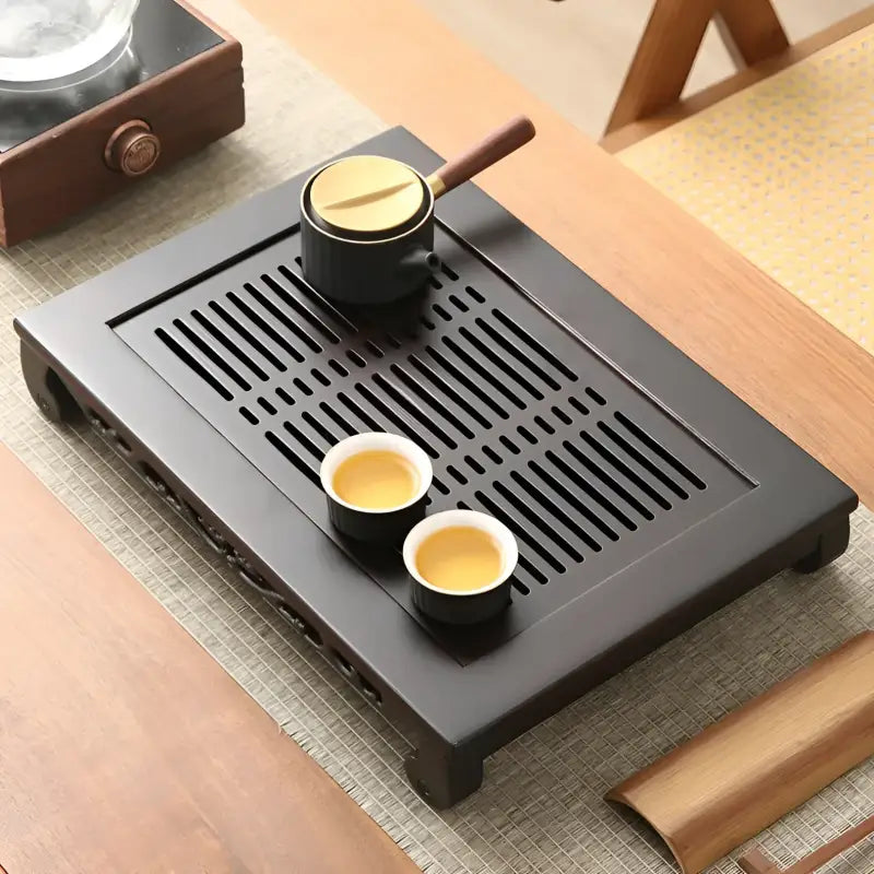Dark wooden Whispering Bamboo tea tray with cups and pot for gongfu tea brewing