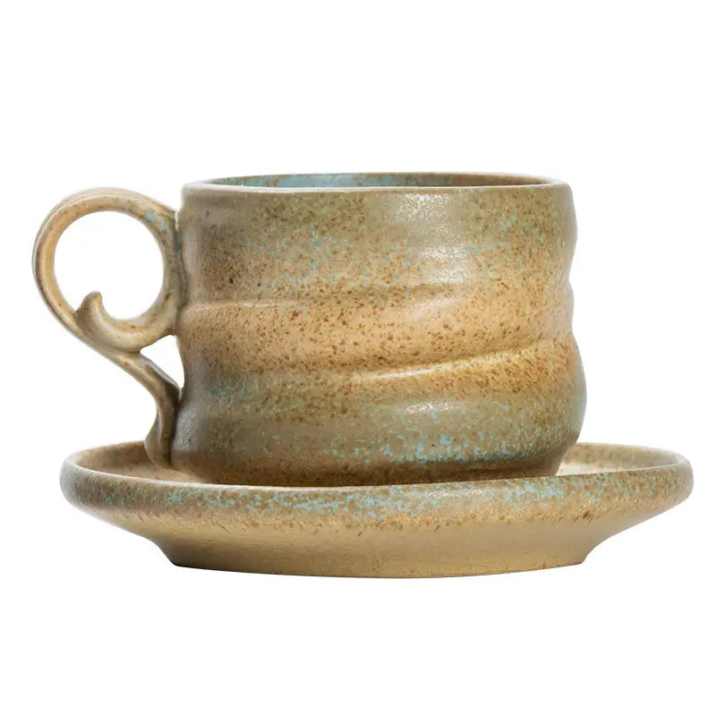 Handcrafted Whispering Earth ceramic coffee cup and saucer for artisan coffee lovers