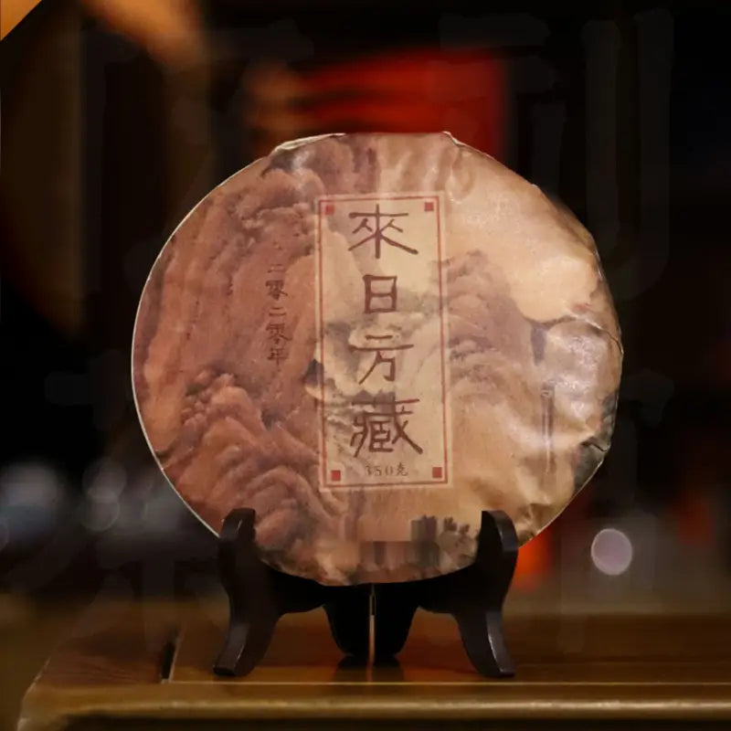 Round tea cake on stand from 2020 aged shoumei white tea with long-term aging