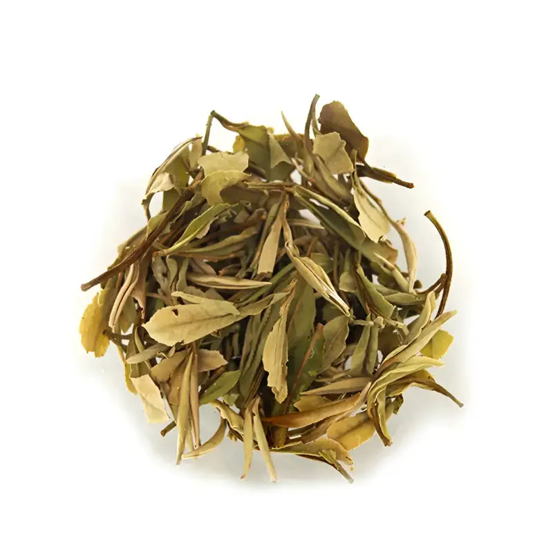 Pile of dried Bai Mu Dan White Tea leaves showcasing quality dan white tea flavor
