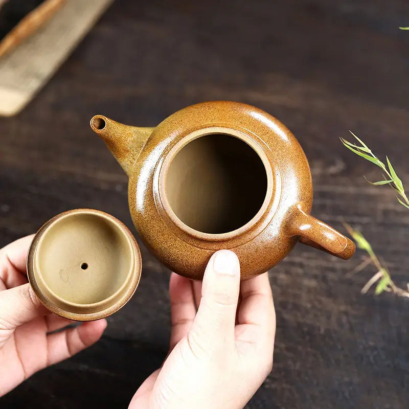 Open Amber Flow Yixing Duanni Teapot with lid made from Duanni clay