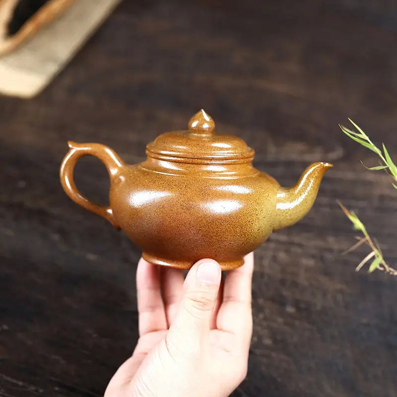 Brown ceramic teapot from Amber Flow made of authentic Yixing Duanni teapot duanni clay