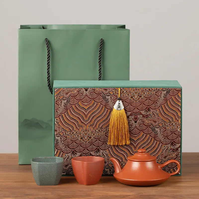 Amber Lotus Tea Set featuring yixing zisha teaware set and decorative box and bag