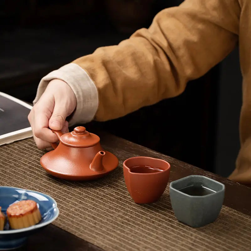 Amber Lotus Teaware Set featuring Yixing Zisha Earthenware Tea Set for brewing