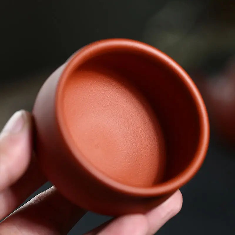 Small round terracotta cup from Amber featuring authentic Yixing Zisha clay for classic Yixing style
