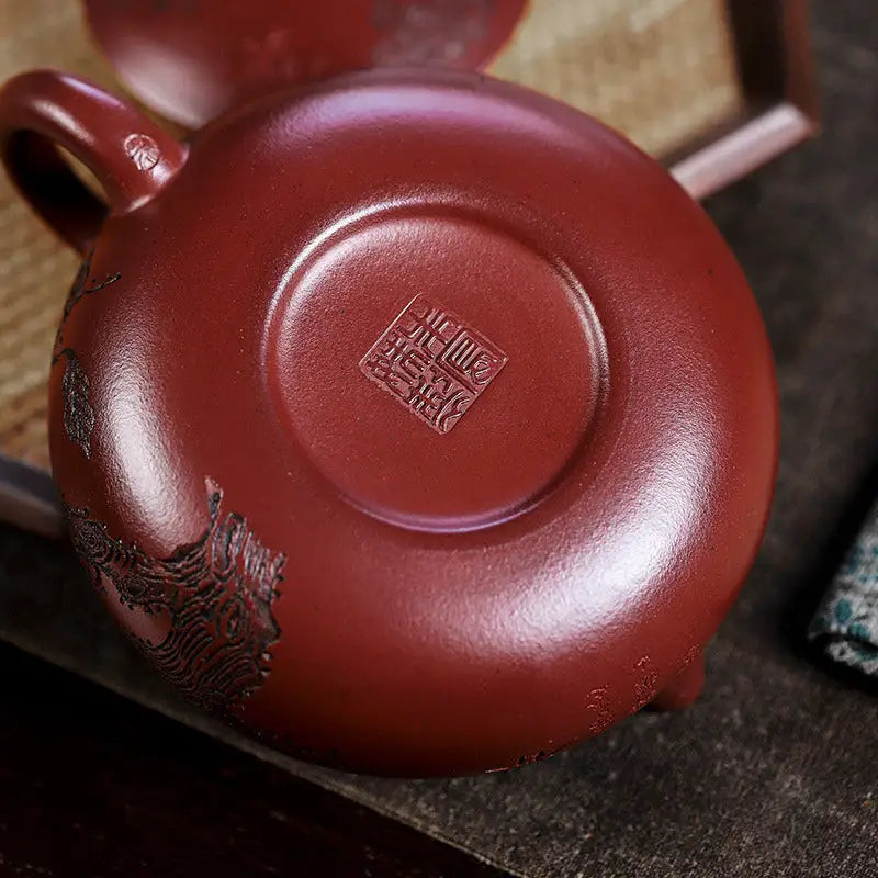 Reddish-brown ceramic teapot from Ancient Plum Tree Yixing Zisha collection