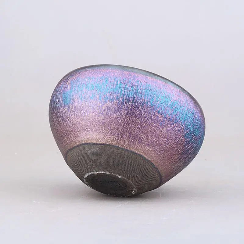 Iridescent purple and blue ceramic Zhan Cup from the Aurora Jian Zhan series