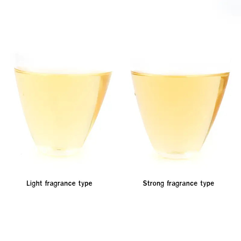 Authentic Anxi Tie Guan Yin Oolong Tea glasses of yellow liquid showcasing red-heart varietals