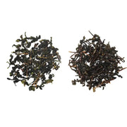 Two piles of dried authentic Anxi Tie Guan Yin oolong tea leaves for red-heart varietals