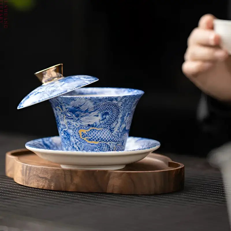 Blue and white dragon teacup with lid from Azure Dragon Gaiwan, perfect for Gongfu tea brewing
