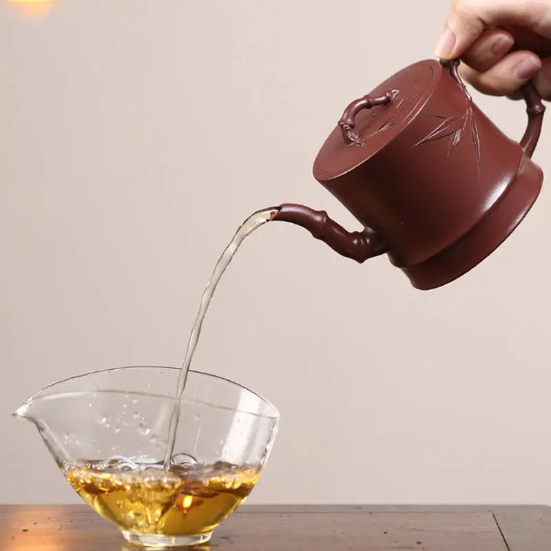 Maroon Gongfu Tea Yixing Zisha Teapot pouring tea from Bamboo Echo