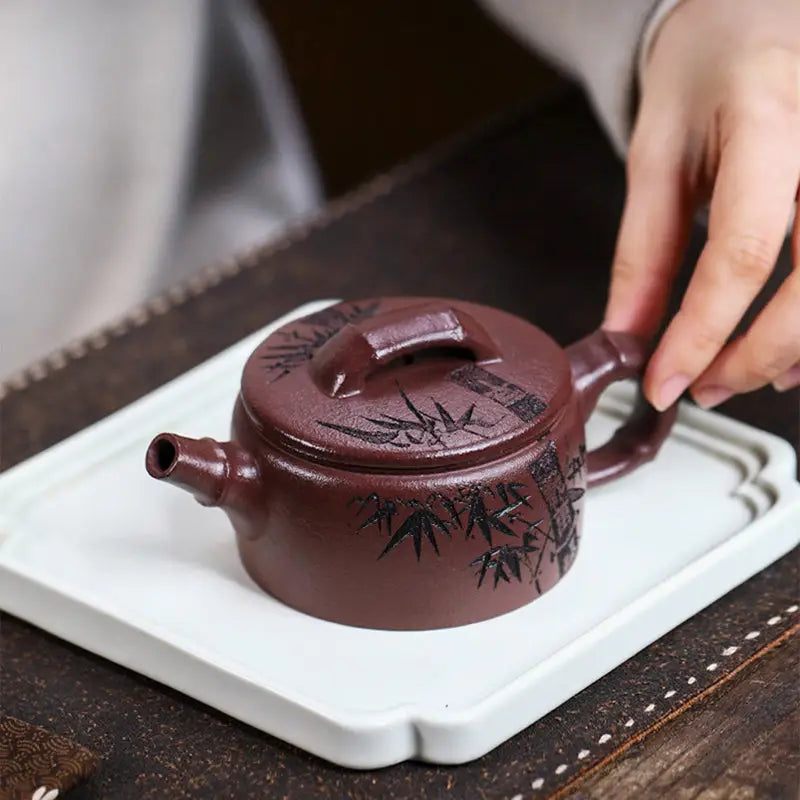Maroon Yixing Zisha Teapot with Hand-Carved Bamboo Design from Bamboo Elegance