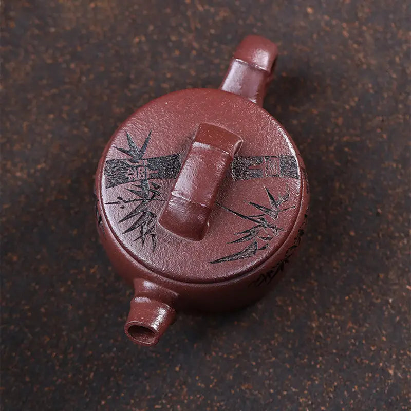 Maroon Yixing Zisha Teapot with Hand-Carved Bamboo Design from Bamboo Elegance
