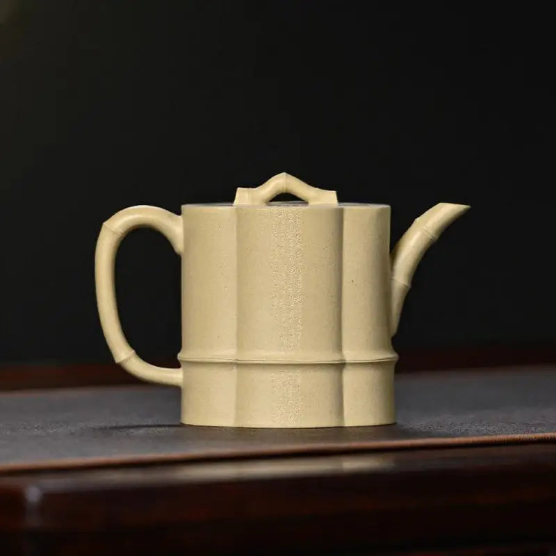 Beige ceramic teapot in Bamboo Flow design made of Yixing Duanni clay