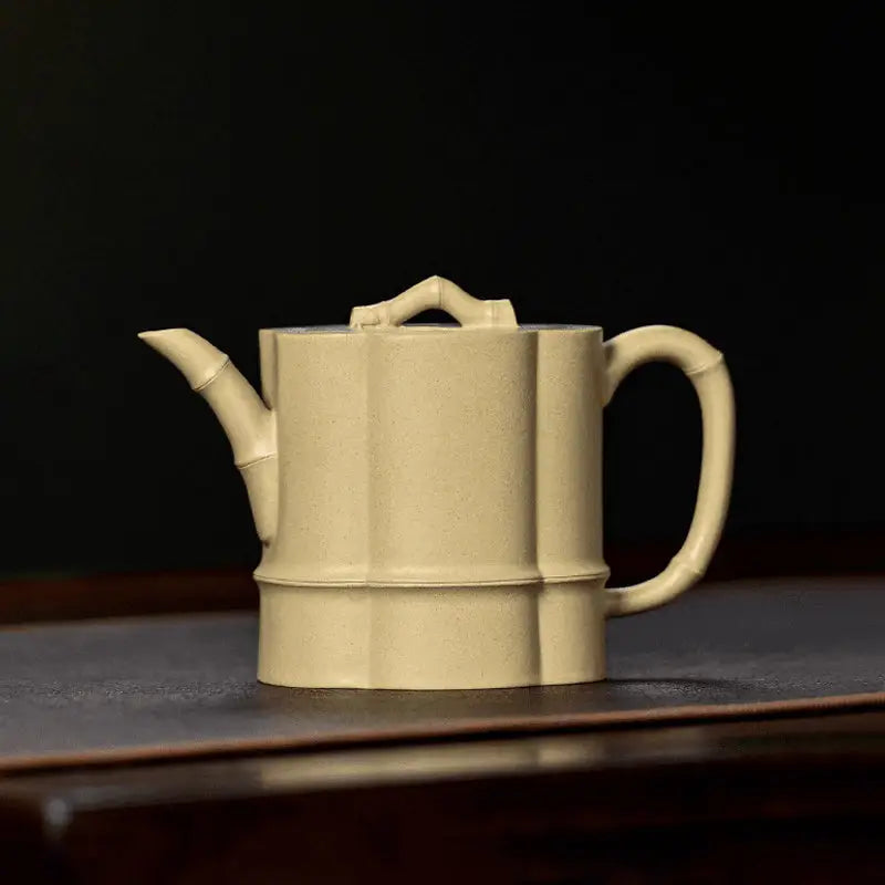Beige ceramic Teapot Bamboo Flow with bamboo-style handle made from Duanni clay