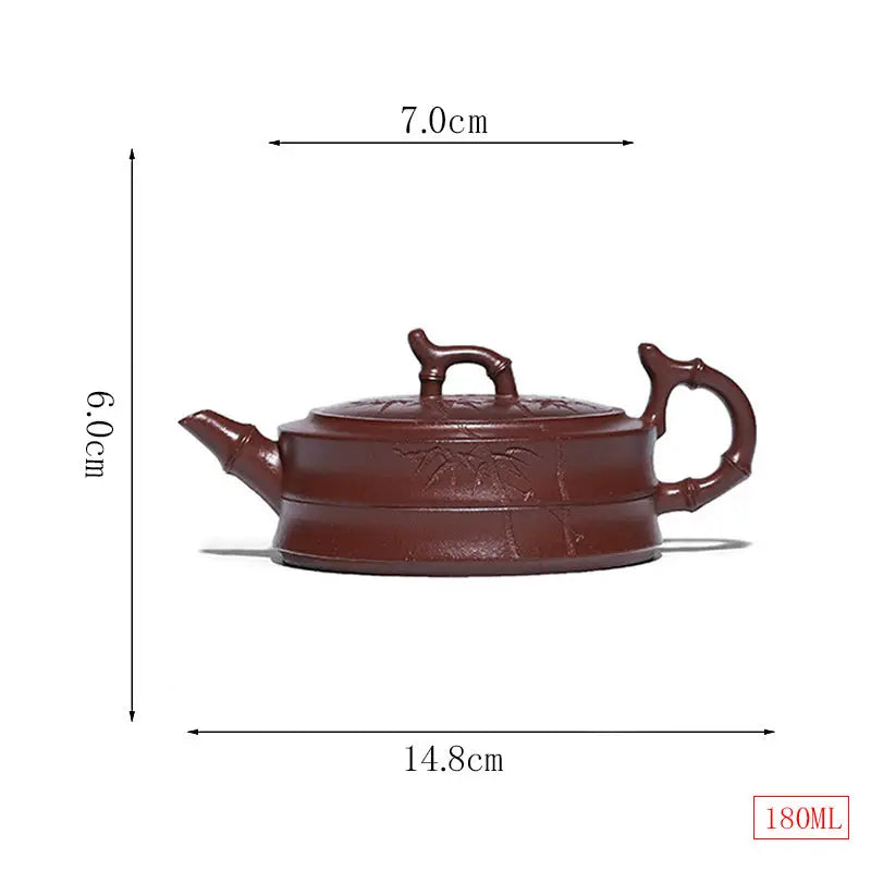 Brown ceramic Bamboo Grove teapot with Yixing Zisha and hand-carved bamboo pattern