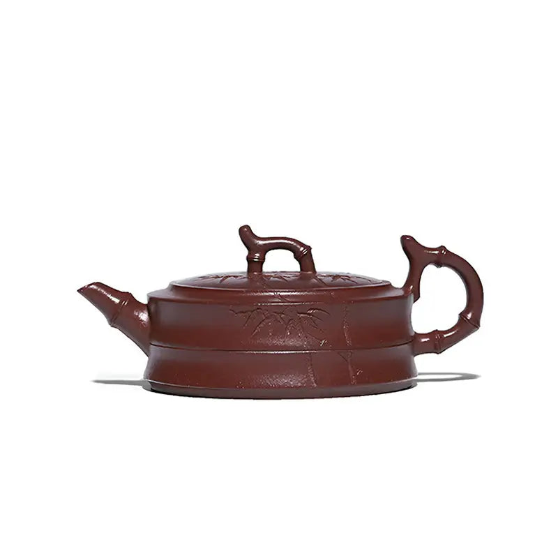 Maroon ceramic Yixing Zisha teapot with hand-carved bamboo pattern from Bamboo Grove