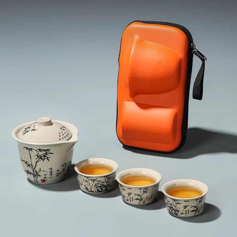 Bamboo and rock ash glaze travel tea set with hand-grip teapot, three cups and orange case – photo 1