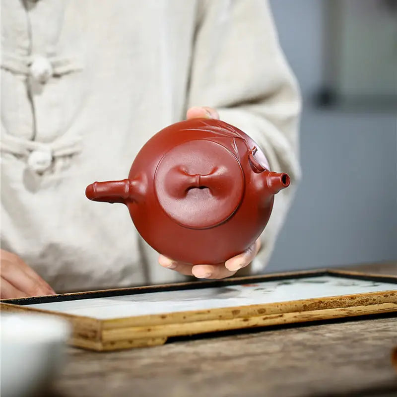 Round reddish-brown teapot from Bamboo Segment, perfect for teapots and tea sets