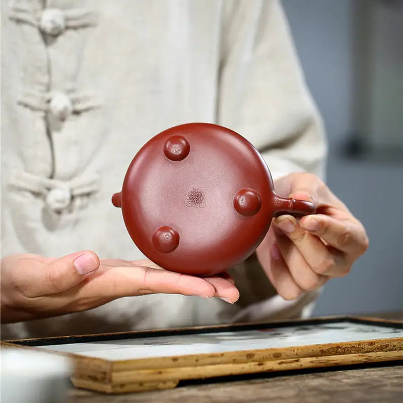 Reddish-brown round teapot with three small feet from Bamboo Segment tea sets