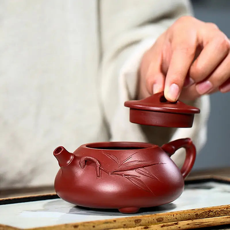 Red-brown ceramic teapot with bamboo design from Bamboo Segment, perfect for teapots and tea sets