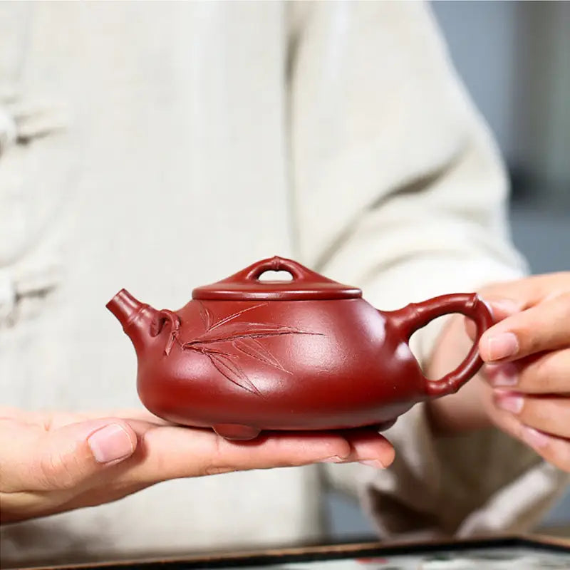 Reddish-brown ceramic teapot from Bamboo Segment perfect for tea sets and mugs