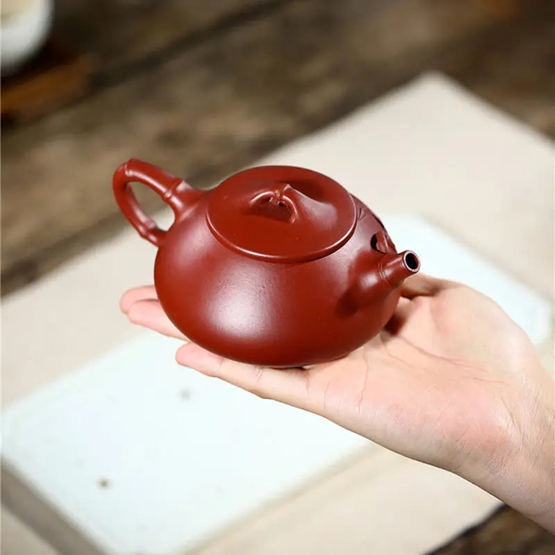 Reddish-brown ceramic teapot from Bamboo Segment, perfect for tea sets and mugs