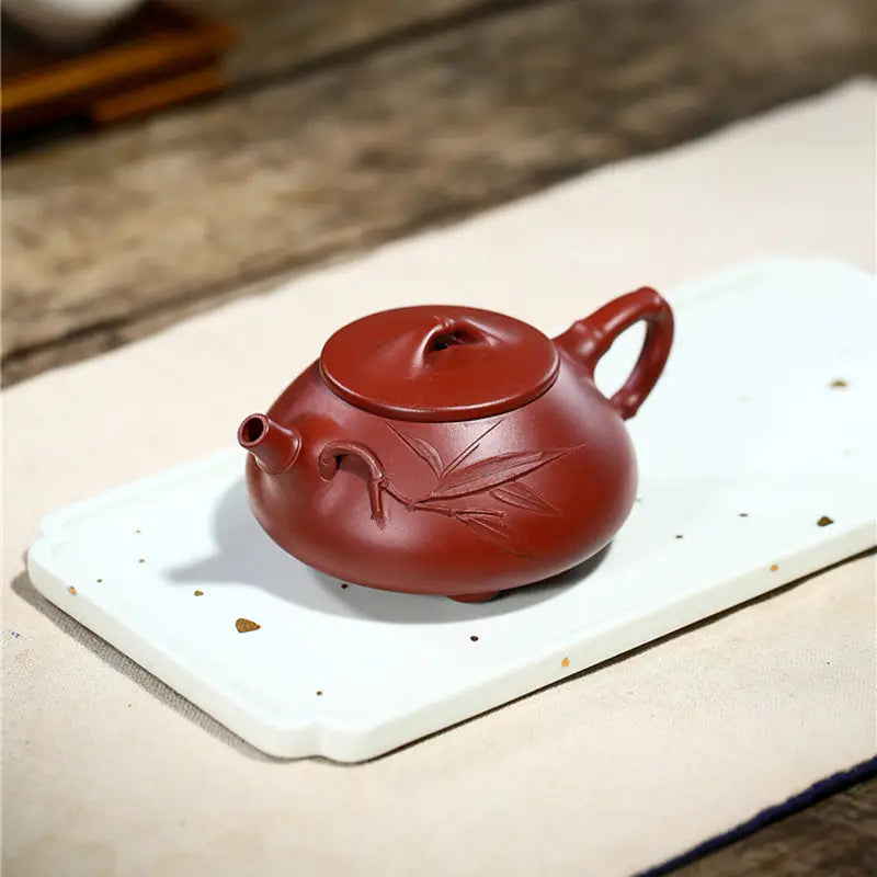 Reddish-brown ceramic teapot with bamboo leaf design from Bamboo Segment tea sets