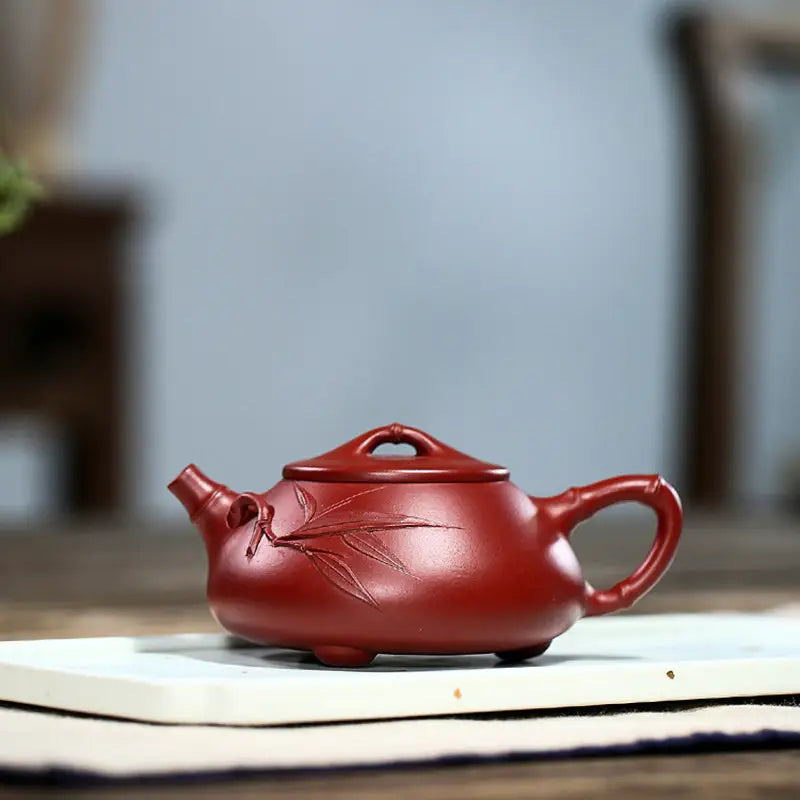 Reddish-brown ceramic teapot with bamboo leaf design from Bamboo Segment tea sets