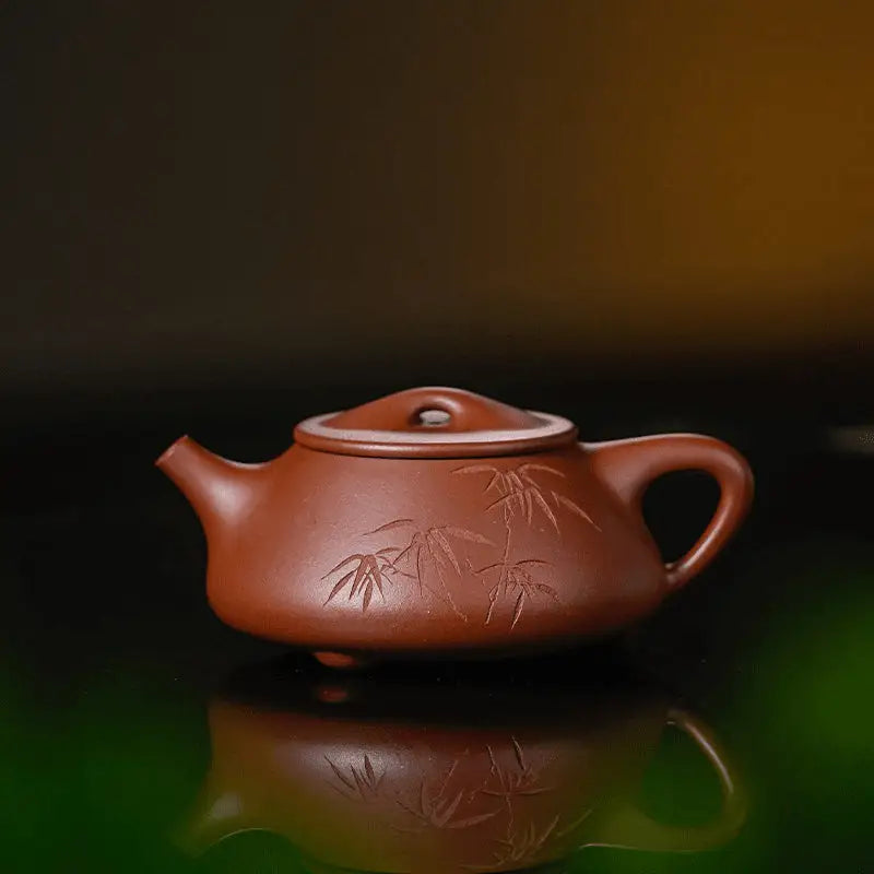 Brown clay Yixing Zisha teapot with bamboo engravings from Bamboo Whisper collection