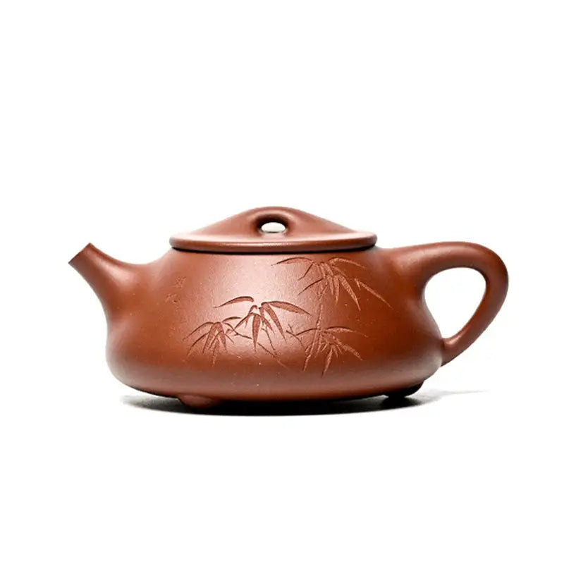 Brown clay Yixing Zisha teapot with Bamboo Whisper bamboo design perfect for tea lovers