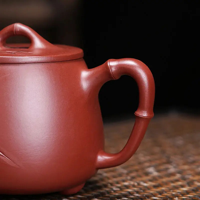 Reddish-brown ceramic teapot with bamboo-shaped handle from Bamboo Zen harmony collection