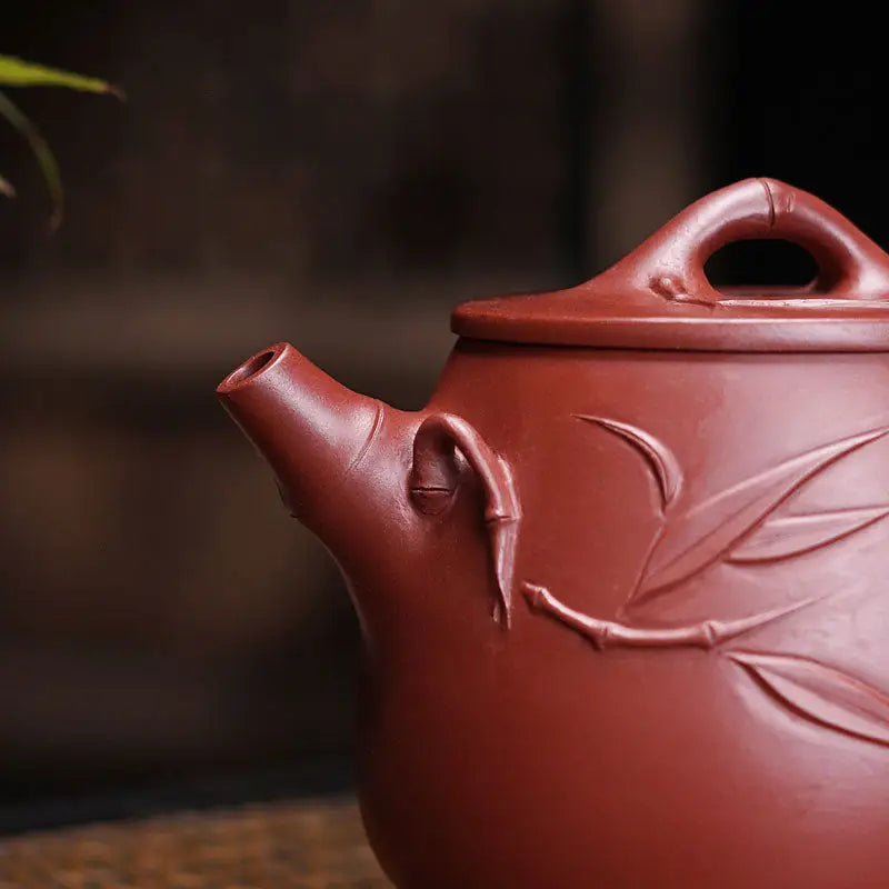 Reddish-brown ceramic teapot with carved bamboo design from Bamboo Zen Harmony collection