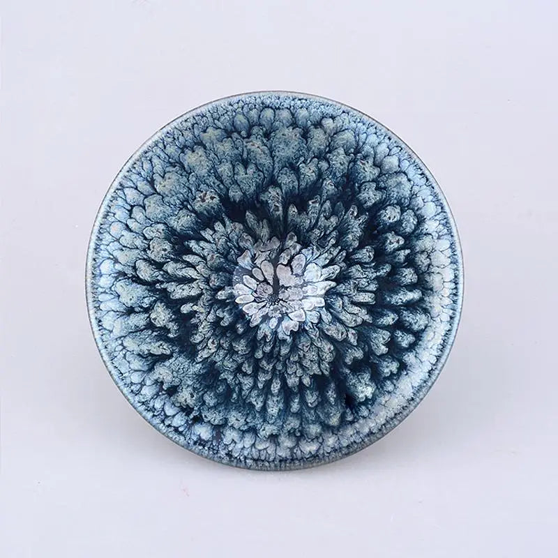 Blue and white patterned ceramic bowl with crystalline glaze from Bloom featuring jian zhan tea