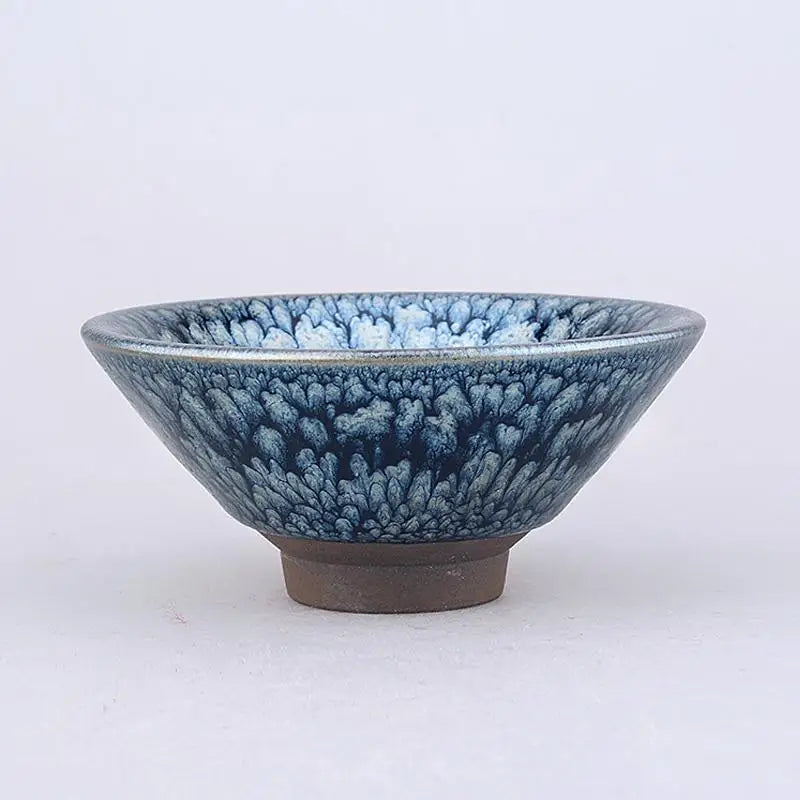 Blue and white glazed ceramic bowl with crystalline glaze from Bloom featuring blooming frost design