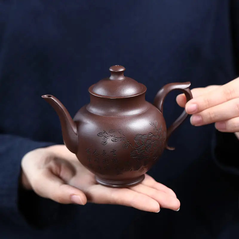 Brown ceramic teapot with floral design in Blooming Scroll Yixing Zisha Zini Clay style