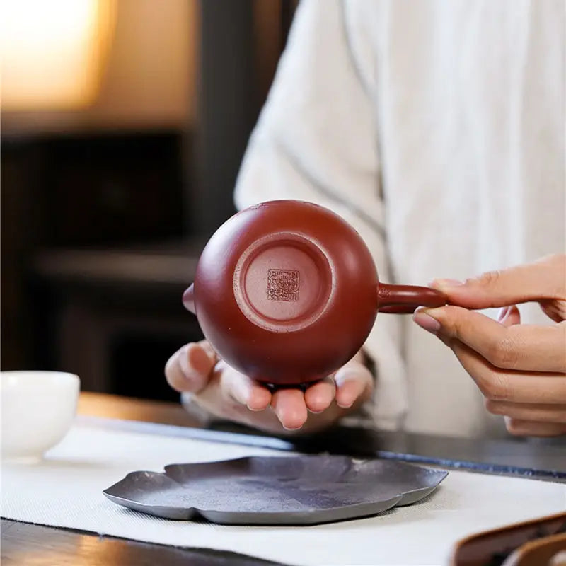 Round brown Yixing Zisha Blossom Verse Yixing Teapot with handle for tea brewing