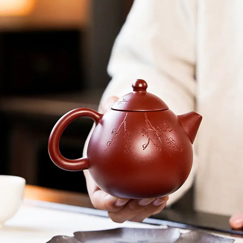 Reddish-brown Blossom Verse Yixing Zisha teapot with floral design for tea lovers