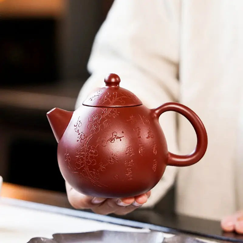 Red-brown ceramic Yixing Zisha teapot with floral design from Blossom Verse collection