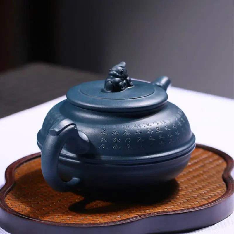 Dark blue ceramic teapot from Blue Poem featuring a rare cobalt azure guardian design
