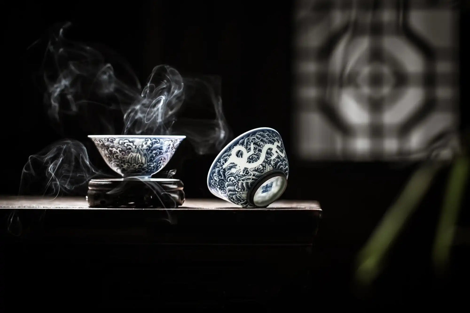 Blue and white patterned teacups.