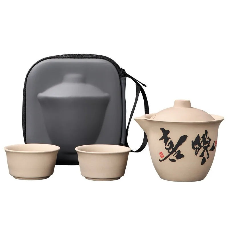 Coarse stoneware travel tea set with calligraphy teapot, two cups and grey case – photo 5