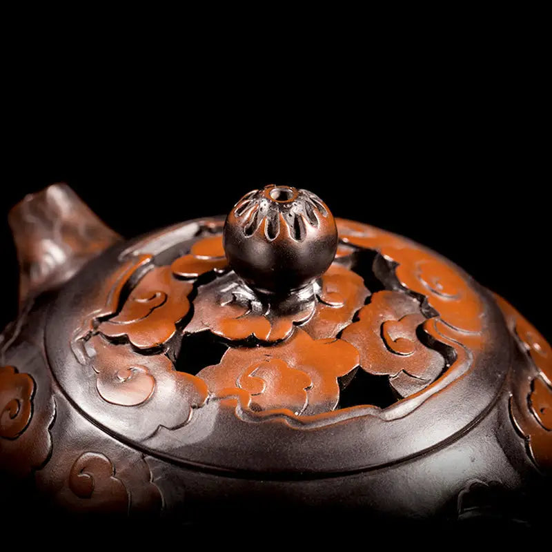 Ornate brown teapot lid from Carving Dragon jianshui zitao teapot with hand-carved dragon