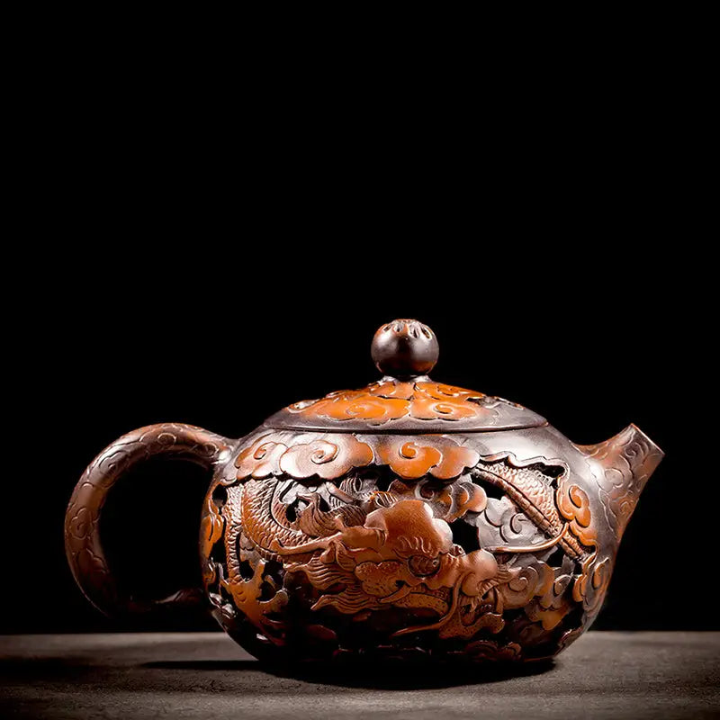 Ornate brown Jianshui Zitao teapot with hand-carved dragon design in Carving Dragon collection