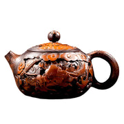 Ornate brown Jianshui Zitao teapot with hand-carved dragon design in Carving Dragon collection