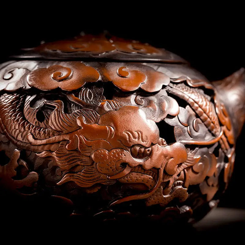 Ornate carving dragon jianshui zitao teapot with hand-carved dragon design