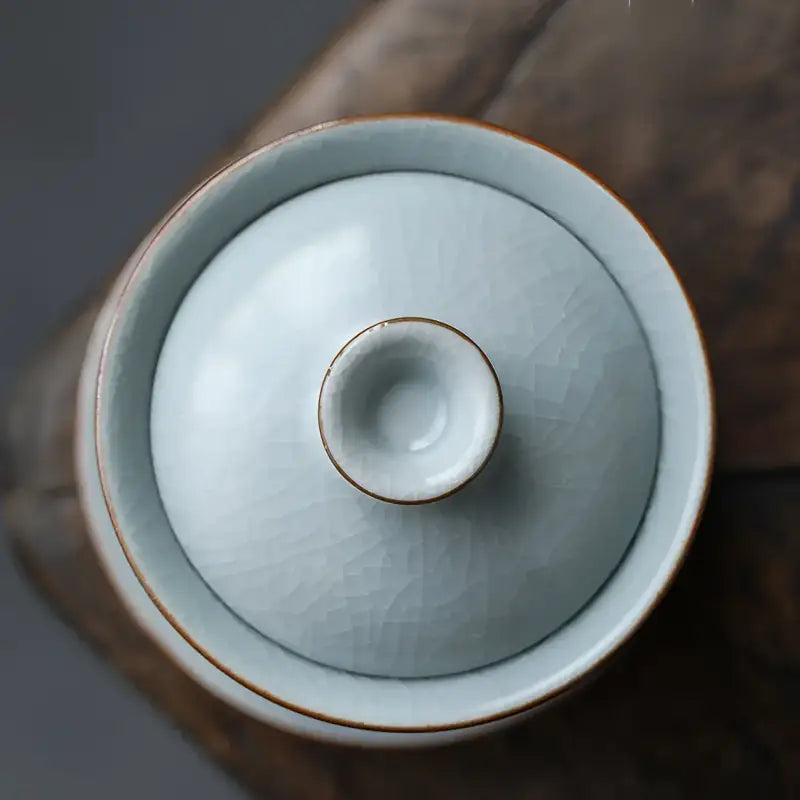 Light blue ceramic kiln gaiwan with crackle glaze and lid for gongfu tea brewing